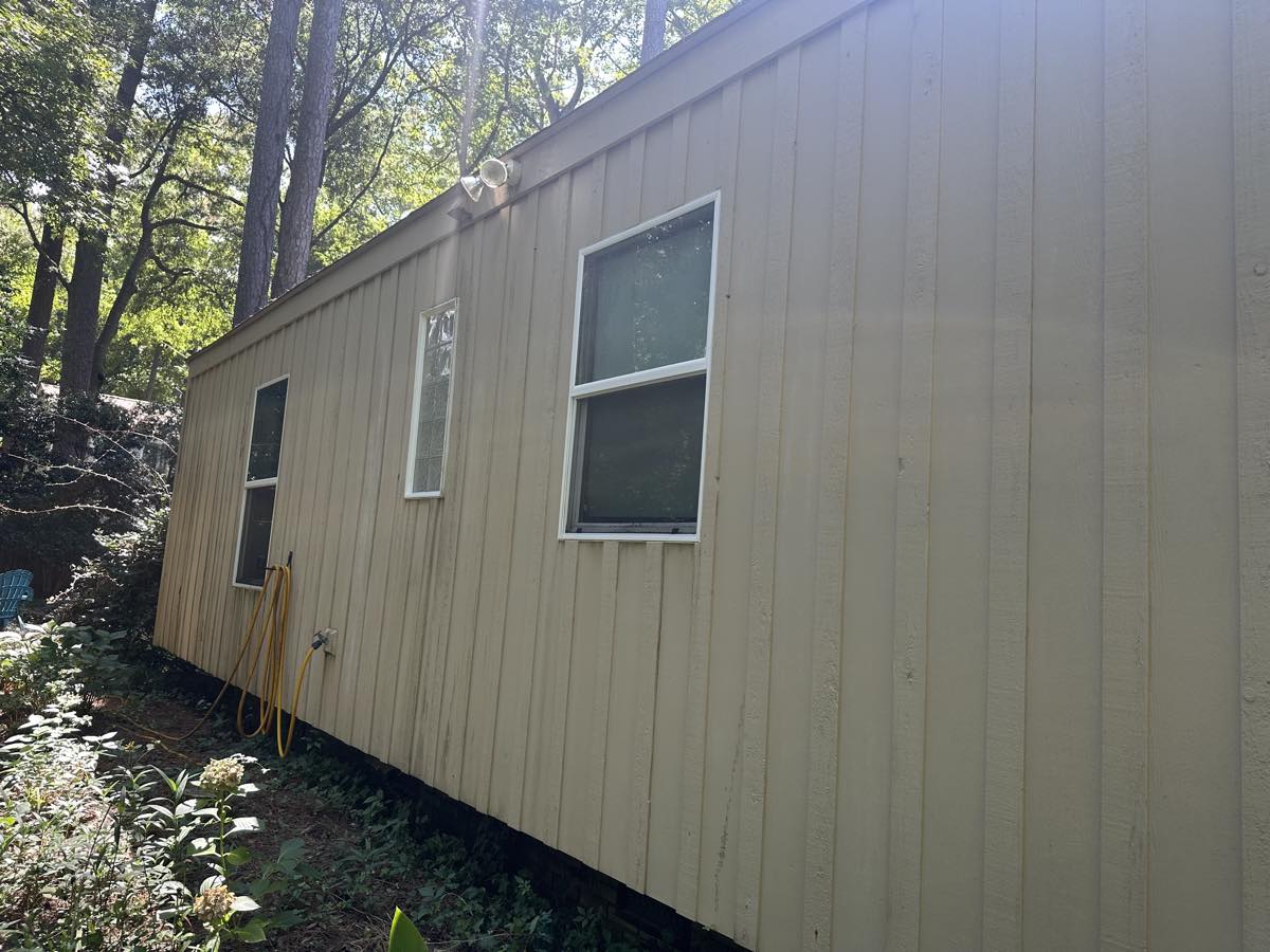 The same siding clean after a soft wash